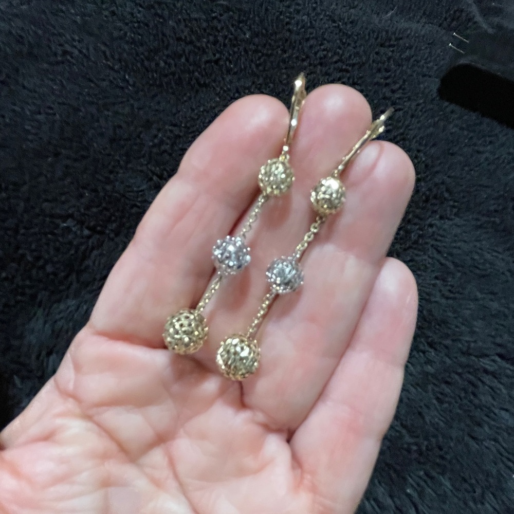 Earrings 10kt Yellow+White Gold, 3 Diamond cut balls.
Everything Sparkles 
New!